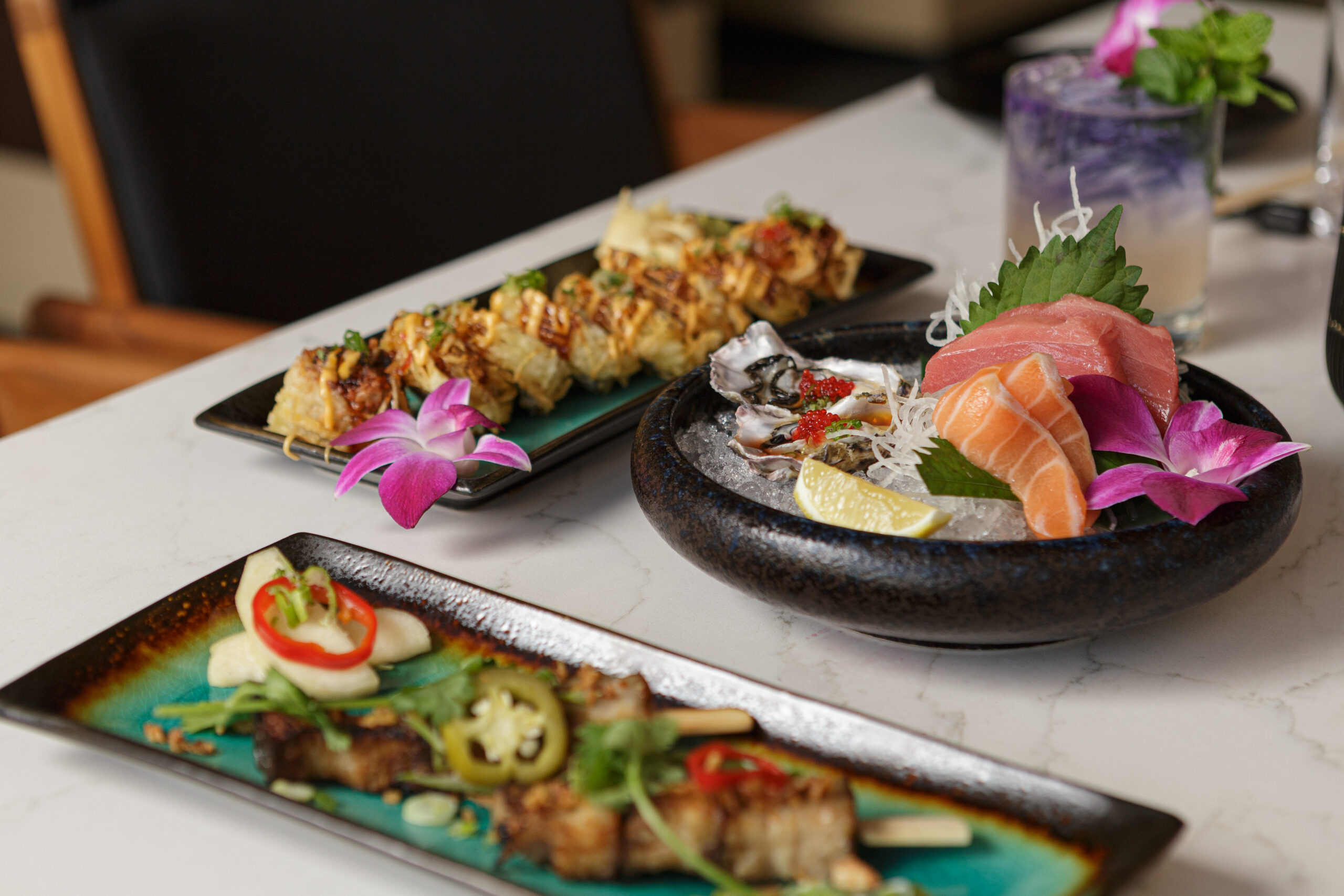 Image of Kai Restaurant food dishes with freshly cut sashimi