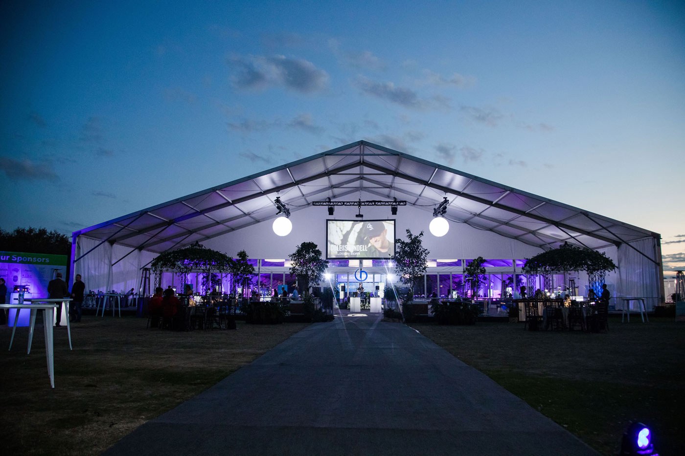 Image of large corporate event at night time